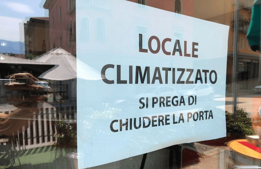 Sobrietà energetica: multe ai negozi con porta aperta e aria condizionata accesa