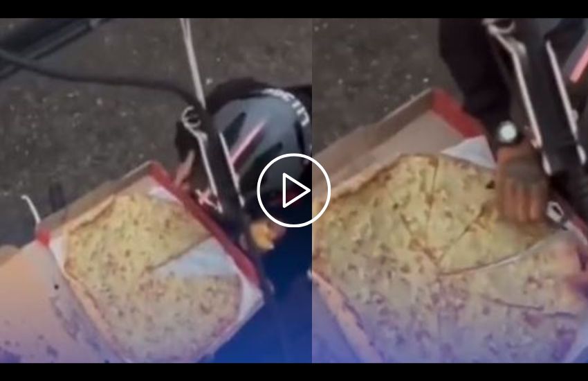 Rider mangia una fetta di pizza prima della consegna: il trucco ingegnoso per farla franca [VIDEO]